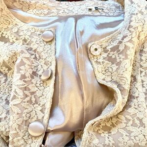 Elegant Cream Lace Coat with Blush Lining